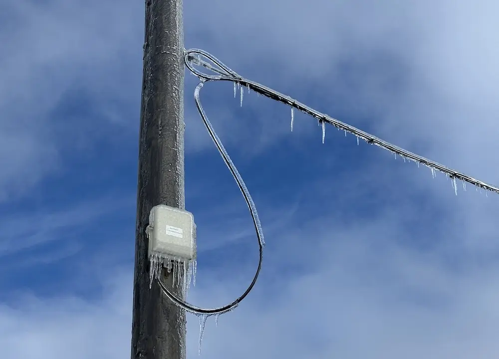 Ice buildup on a power line in Northern Michigan during the 2024 ice storm that left thousands of people without power and heat for weeks.